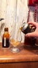 Pouring Dark Flower mead from a can in the tasting room.